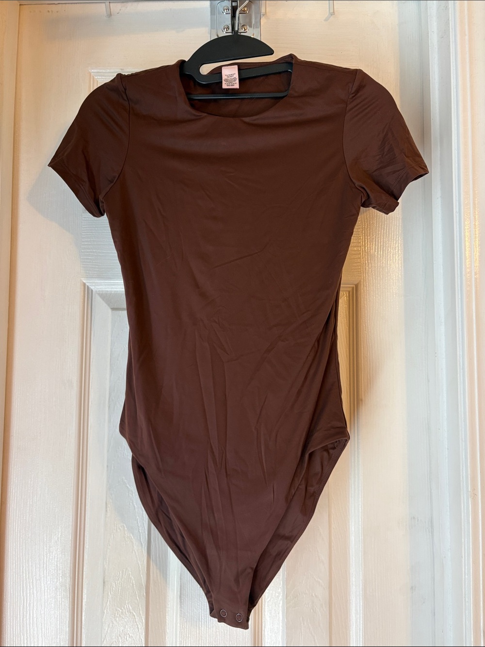 NWOT Victoria Secret body suit. Size small in Chocolate.